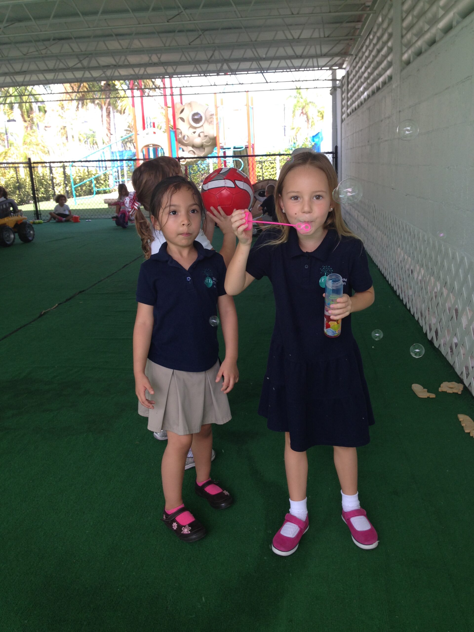 Older children reading and collaborating in the classroom